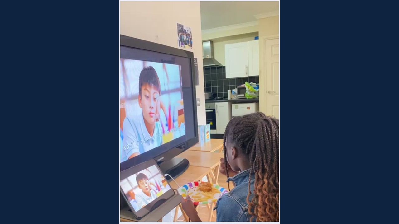 A young builder at the screen